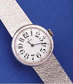TISSOT DAMENGOLDBANDUHR, SCHWEIZ FüR DEN DTSCH. MARKT UM 1985, WG 585/000 RHOD. INCL. MILANAISEBAND, BODEN GEDR., EMAILFARB. KON- ...