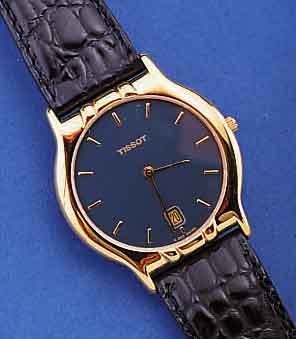 TISSOT HERRENARMBANDUHR, UNGETR. LAGERW., SCHWEIZ UM 1995, ULTRAFLACHE AUSF., GESAMTH. CA. 5 MM, METALL HARTVERG., EDELST.-BODEN GEDR., ...