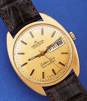 HELVETIA HERRENARMBANDUHR GOLDEN GATE AUTOMA- TIK SERIE BIGMASTER, SCHWEIZ UM 1965, GG 750/000, BODEN GESCHR., BEI FERTIGST. WASSER- GESCH., WERK ...