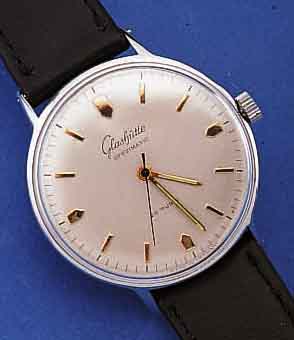 GLASHÜTTE HERRENARMBANDUHR, DEUTSCHLAND UM 1968, METALLGEH. NACHVERCHR., EDELST.-BODEN GEDR., 26 ST., ZENTRALROTOR, KAL. 74/723, STOßGES., ...