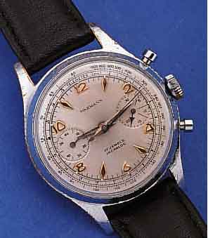 WAKMANN ARMBANDCHRONOGRAPH, SCHWEIZ/FRANK- REICH UM 1959, METALL VERCHR., BER., EDELST.- BODEN GESCHR., 30-MIN.-STOPPZäHLER, BLATT REST., ...