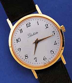 GLASHÜTTE HERRENARMBANDUHR, DEUTSCHLAND UM 1980, FüR DEN EXPORT, METALL VERG., EDELST.- BODEN GEDR., EMAILFARB. KONTRASTZIFFERBL., ...