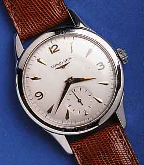 LONGINLONGINES HERRENARMBANDUHR, SCHWEIZ UM 1956, EDELST., BODEN GESCHR., BLATT REST., 17 ST., HANDAUFZUGKAL. 12,68Z, SCHR.-GLYC.-UNR., ...