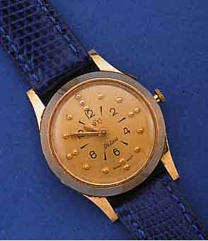 AS BLINDENUHR, SCHWEIZ/USA UM 1962, GG 585/ 000, BODEN GEDR., LÜNETTE M. SPRUNGDECKELEFF., VERST. ZEIGER, STD.-TASTSYMB., SIGN. A.F.B. (AMERICAN ...