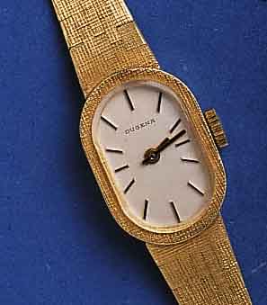 DUGENDUGENA DAMENGOLDBANDUHR, DEUTSCHLAND UM 1982, GG 585/000 INCL. BAND, NAGELMUSTERDESIGN VON BAND IN LÜNETTE ÜBERGEHEND, BODEN GEDR., ...