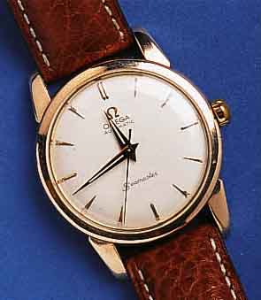 OMEGA HOMEGA HERRENARMBANDUHR SEAMASTER AUTOMATIK, EDELST., STARKE RG-HAUBE, BODEN GEDR., SCHWEIZ UM 1953, KAL. 501, ZENTRALROTOR, SCHR.-GLYC.- ...