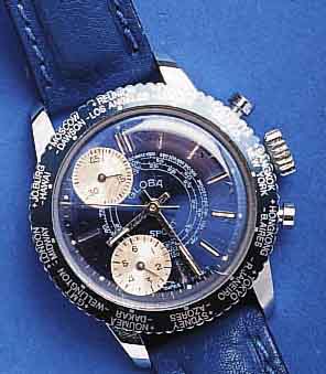 GLOBA HGLOBA HERRENARMBANDUHR EINFACHE STOPPFUKTION MIT WELTZEITANZEIGE AUF DREHLÜNETTE, SCHWEIZ UM 1968, METALL VERCHR., EDELST.-BODEN GEDR., ...