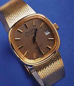 GLASHÜTTGLASHÜTTE HERRENARMBANDUHR, SPEZIMATIC, ME- TALLGEH. VERG., EDELSTAHLBD. GEDR., AB HERST. WASSERGESCH., ORIG. EDELST.BAND DOUBLE, DAT., ...