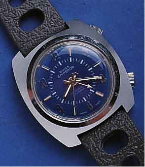 EMPEROEMPEROR ARMBANDWECKER, SCHWEIZ UM 1968, METALLSTÜLPGEH. HARTVERCHR., EDELST.-BODEN GEDR., SCHWEIZER STIFTENANKERW., STOßGES., 17 ST., ...
