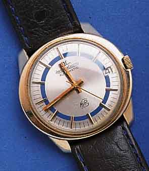 JAEGER LJAEGER LE COULTRE HERRENARMBANDUHR, GG-FIL- LED, EINSCHALENGEH., AB HERST. WASSERGESCH., DAT.-SCHNELLKOR. DURCH DRÜCKER. KRONE, AUTO- ...
