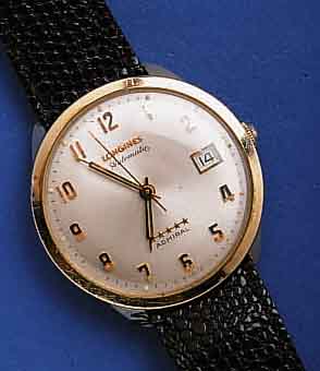 LONGINLONGINES HERRENARMBANDUHR ADMIRAL (FIVE STARS) , GG-FILLED, EINSCHALENGEH., AB HERST. WAS- SERGESCH., AUTOMATIK, 17 ST., KAL. 505, DATUM, ...