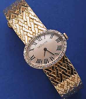 LE COULLE COULTRE DAMENGOLDBANDUHR, GG 585/000- GEH. INCL. GG-FLECHTBAND, LÜNETTE M. 40 8/8 DIAMANTEN ZUS. CA. 0.18 CT, 17 ST., ANKERFORM- WERK, ...