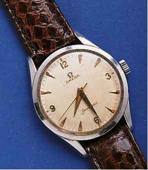 OMEGA HERRENARMBANDUHR SEAMASTER, EDELST., BODEN U. GLASR. GEDR., SCHWEIZ UM 1959, ORIG.- BLATT ALTERSBED. FARBL. GET., KRONE U. LEDERB. NEUTR. ...
