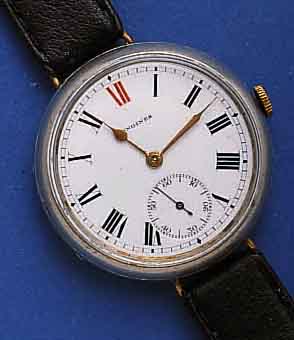 LONGINESLONGINES HERRENARMBANDUHR, SCHWEIZ UM 1914, NICKEL, BODENSCHARNIER, GLASR. GEDR., BANDAN- ST. CA. 1930 VERÄNDERT, ORIG.-EMAILBL. SIGN. ...