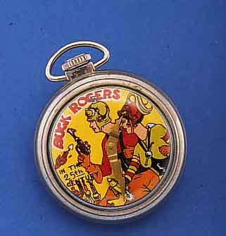 BUCKBUCK ROGERS COMIC TASCHENUHR, USA 60ER JAHRE NICKEL, STIFTENANKERW. M. KÖRNERUNR., MODELL 90001, D. CA. 50 MM, GEHFÄHIG, INTAKT, KL. SEK. ...