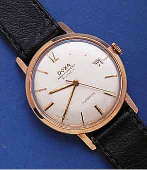 DOXA HERRENARMBANDUHR AUTOMATIK, SCHWEIZ UM 1959, RG 585/000, BODEN VERSCHR., BANDANST. L. VERZ., 21 ST., ZENTRALROTOR, SCHR.-UNR., FLACHSPIR., ...