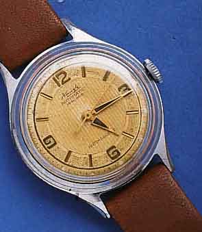 KIENZLEKIENZLE HERRENARMBANDUHR AUTOMATIK (SOGENANN- TE VOLKSAUTOMATIK), DEUTSCHLAND UM 1958, METALL VERCHR., EDELST.-BODEN GEDR., ORIG.- BLATT, ...