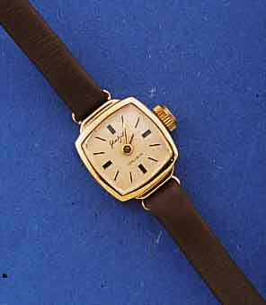 GLASHÜTTE DAMENGOLDUHR, DEUTSCHLAND UM 1969, GG 585/000, BOD. AUFGEDR., 17 ST., FORMANKERW. ,KAL. 08-20, HANDAUFZ., EIGENE STOßSICHERUNG, ...