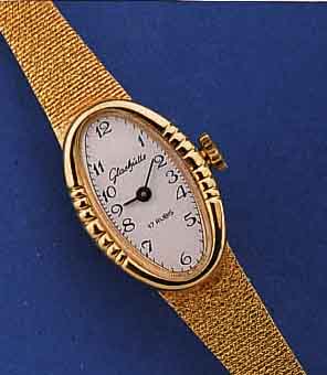 GLASHÜTTE DAMENARMBANDUHR, DEUTSCHLAND UM 1980, METALL VERG., INCL. METALL-BD., BOD.AUF- GEDR., KONTRASTZIFFERBL., FORMANKERWERK, KAL. 0920, ...