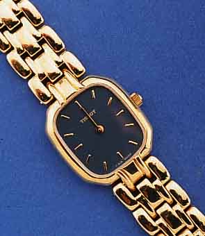 TISSOT DAMENSCHMUCKBANDUHR, SCHWEIZ UM 1998, FLACHE AUSFÜHRUNG, METALLGEH. U. BAND HARTVER- G., EDELST.-BOD. AUFGEDR., AB HERST. WASSER- GESCH., ...