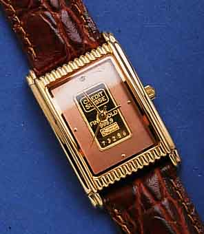CREDIT CREDIT SUISSE GOLDBARREN HERRENARMBANDUHR, SCHWEIZ, UNGETR. UM 1995, METALL, RECT.-FORM, HARTVERG., EDELST.-BODEN GEDR., HIGH-TECH- ...