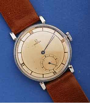 OMEGA HERRENARMBANDUHR, ART-DECO, 1940, EDELST., BOD. U. GLASRAND AUFGEDR., D. 35 MM, AUßER LEDERBD. U. KRONE ORIG.ZUSTAND, 15 ST., ...