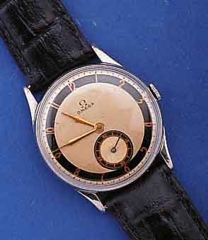 OMEGA HERRENARMBANDUHR, SCHWEIZ UM 1940, FLACHES EDELST.GEH., GLASRAND AUFGED., 2FARB. ORIGINALBL., FORMANKERW., 15 ST., HANDAUFZ., KAL. R17,8, ...