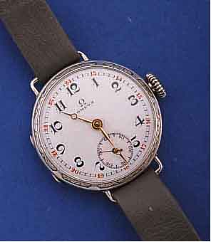 OMEGA DAMENARMBANDUHR, SCHWEIZ UM 1935, SILBER (900), BOD. M. SCHARNIER, GLASRAND SCHMUCKGEPRÄGT AUFGEDR., PERF. EMAILBL., SIGN. AUßEN ROT 13-24, ...
