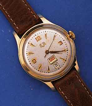 GLASHÜTTE HERRENARMBANDUHR M. TAG U. DATUM, DEUTSCHLAND UM 1960, METALL, VERG., EDELST.- BOD. GESCHR., NUTZSP., DATUMSCHNELLKORREKTUR DURCH ...