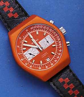 HERZFELD ARMBANDCHRONOGRAPH, SCHWEIZ UM 1974, METALL ORANGE MATT., EDELST.-BODEN GESCHR., MINERALFLACHGL., 30-MIN.-STOPPZÄHLER, DATUM BEI 6, 17 ...