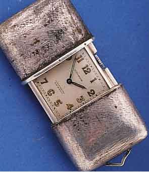 MOVADO REISE/SCHIEBEÜHRCHEN, SCHWEIZ UM 1937, 935ER SILBER, AUFZUG U. ZEIGERST. DURCH KRONE AUßEN 12, ORIG.-BLATT, ALTERSBED. FL., KAL. MN150, ...