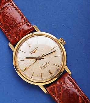 LONGINELONGINES HERRENARMBANDUHR AUTOMATIK FLAGSHIP, SCHWEIZ UM 1965, GG 750/000, BODEN U. GLASR. GEDR., ORIG.-BLATT FL., AUFGEL. GOLD-STD.- ...