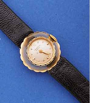 UNIVERSAL GENEVE DAMENGOLDUHR, AUFWENDIGES GG 750/000-GEH., BOD. AUFGEDR., LÜN. NACH OBEN GESCHW., TEILVERDECKTE BANDANST., ORIG. GL. ...