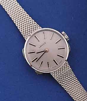LANCO/TISSOT DAMENGOLDBANDUHR, SCHWEIZ UM 1970, UNGETR. LAGERW., WG 333/000-GEH. INCL. WG-FLECHTB. RHOD., BODEN GEDR., FORMANKERW., TISSOT-KAL. ...