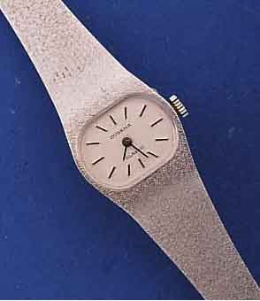 DUGENA DAMENGOLDBANDUHR SERIE CLASSIC, DEUTSCHLAND/SCHWEIZ UM 1970, WG 585/000 INCL. WG-MILANAISEBAND, BODEN GEDR., UNGETR. LAGERW. ...
