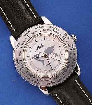 MIDO HERRENARMBANDUHR, WORLDTIMER, SCHWEIZ UM 1990, EDELST., BOD. GESCHR., SAPHIRFLACHGL. , HIGH-TECH-QUARTZWERK, WELTZEIT ZU KOORD. DURCH ...