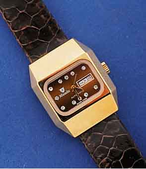 NIVADA AUTOMATIK ARMBANDUHR, UNGETR. LAGERW. , SCHWEIZ UM 1969, METALL HART VERG., EDELST.- BOD. GESCHR., MINERALFLACHGL., DAT., TAGESANZ. IN ...