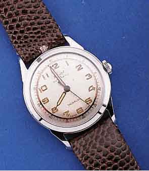 MASCOT ARMBANDUHR AUTOMATIC, SCHWEIZ, FÜR D. BRIT. MARKT, UM 1958, IN ANLEHNUNG AN DEN PFERDESPORT (ASCOT) MIT HUFEISENSYMBOLIK, METALL, HART ...