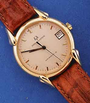 UNIVERSAL GENEVE HERRENARMBANDUHR UNISONIC-B, SCHWEIZ UM 1972, METALL HARTVERG., BEIDS. MINERALVERGL., WOHL AUS RESTBST. AKTUELLE RE- MONTAGE, ...