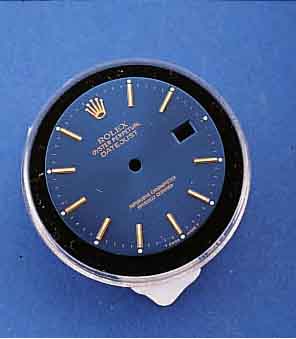 ZIFFERBLATT FÜR ROLEX OYSTER PERPETUAL DATE JUST, LT. GEBR., NACHTBLAU, AUFGES. GOLD- STUNDENZEICHEN, D. CA. 28 MM, ZIFFERBL.FÜßE ZWISCHEN 3 U. ...