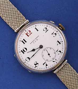 MERMOD FRERES FÜHE ARMBANDUHR, SCHWEIZ UM 1922, SILBER (875), FÜR DEN DEUTSCHEN MARKT, D. 38MM, BEWEGL. BANDANSTÖßE, EMAILBL. (FEIN- ...