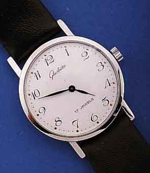 GLASHÜTTE HERRENARMBANDUHR, DEUTSCHLAND UM 1984, METALL HART VERCHR., EDELST.BOD. GEDR., EMAILFARB. KONTRASTZIFFERBL., LEDERBD., DAMEN- ...