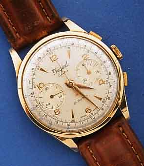 PHIGIED ARMBANDCHRONOGRAPH, SCHWEIZ UM 1958, GG 750/000, GEH-BODEN ZU ERS., METALLCUV. VERG., GLASR. GEDR., VERS. BLATT, 45-MIN.- STOPPZÄHLER, ...
