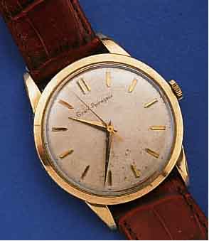 GIRARD PERREGAUX HERRENARMBANDUHR, SCHWEIZ UM 1956, METALL M. ROSE-GOLDAUFL., BER., BLATT FL., 17 ST., HANDAUFZUG, WERK-NR. 200936 7, SCHR.-UNR., ...