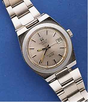 TISSOT HERRENARMBANDUHR, SCHWEIZ UM 1972, EDELST. INCL. ORIG. EDELST.-BOD., BOD. GESCHR. , DATUM MIT SCHNELLKORR. DURCH DRÜCKERKRONE, MOD. SERIE ...