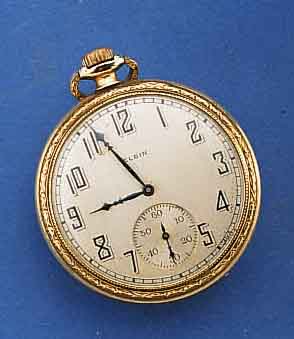 ELGIN HERRENTASCHENUHR, USA UM 1923, METALL, GG-AUFL. BER., MONOGR. CCP, BL. VERS., STD.- ZEICHEN M. SCHATTENEFFEKT, GEBL. STILFORM- ZEIGER, 7 ST., ...