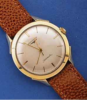 LONGINES HERRENARMBANDUHR, AUTOMATIK, SCHWEIZ/USA UM 1956, GG-FILLED, BOD. VERSCHR. (SCHRAUBRING EDELST.), BL. VERS., 17 ST., ZENTRALROT. M. ...