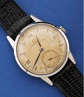 OMEGA HERRENARMBANDUHR, SCHWEIZ UM 1951, EDELST., BOD. U. GLASRD. AUFGEDR., ORIG. BL. FLECKIG, WERK ROT VERG., 15 ST., HANDAUFZUG, KAL. 265, ...