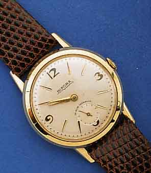 BIFORA GOLDARMBANDUHR, UNTER CHRONOMETERBED. JUSTIERT, MODELL UNIMA, DEUTSCHLAND UM 1960, GG 585/000, BOD. AUFGEDR., KL. SEK. VERTIEFT, 18 ST., ...