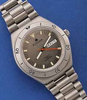 TUTIMA HERRENARMBANDUHR, MODELL PACIFIC, EDELST. MATT., DEUTSCHLAND UM 1997, EDELST.- BD. M. SICHERHEITSFALTSCHL., MINERALFLACHGL., TAG U. DAT. ...